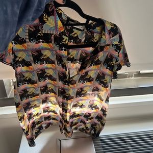 Alice and Olivia beautiful blouse with cute detail. Multicolor